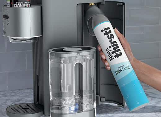 1. Install CO₂ canister into machine