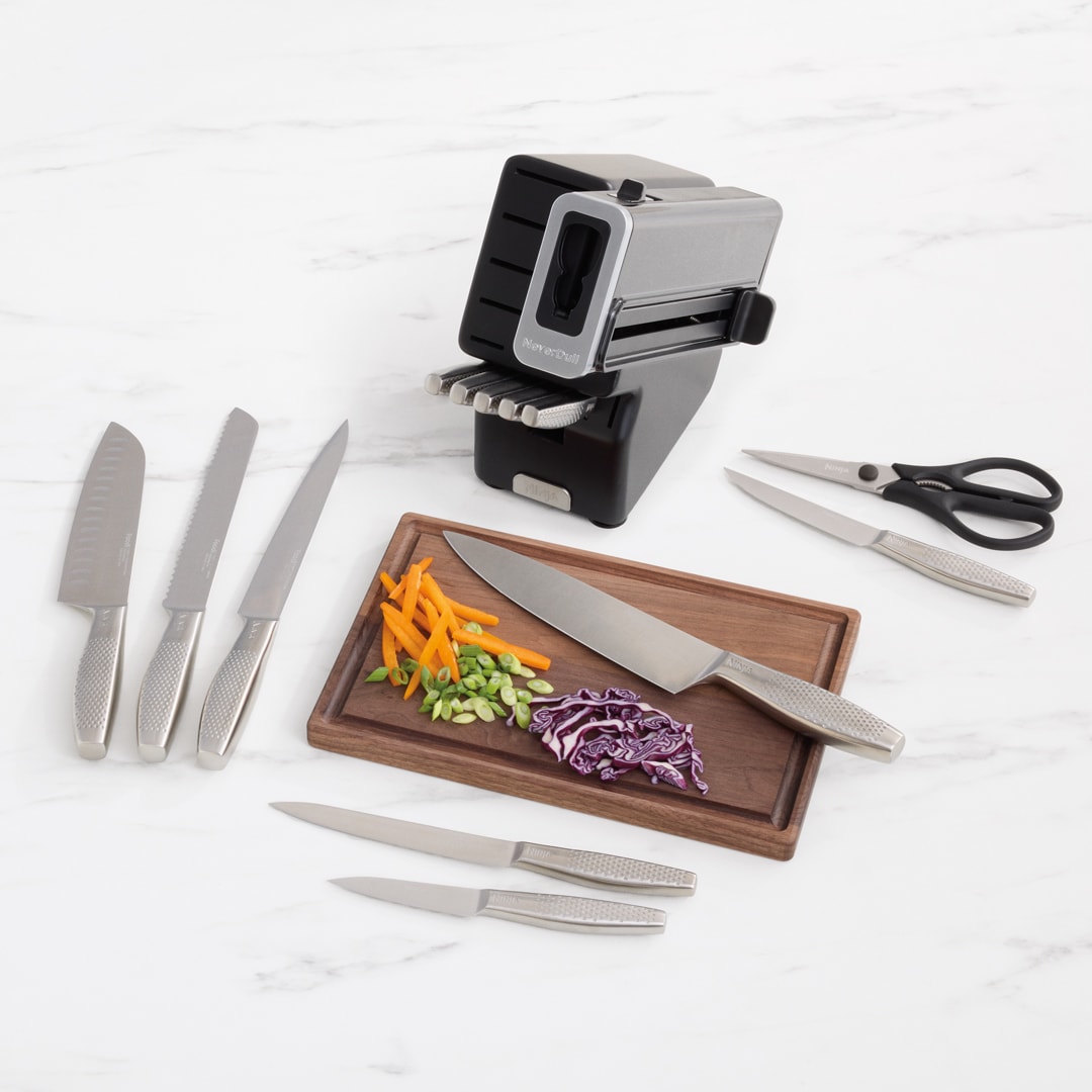 stainless knife set with chopped peppers green onions and cabbage